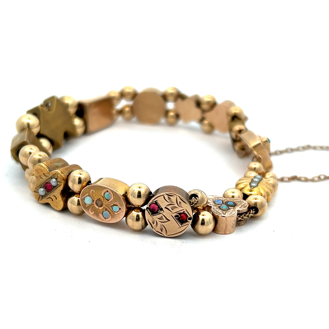 Late 1800s Slide Bracelet, Mixture Of 14K, 10K, And Gold Filled Charms