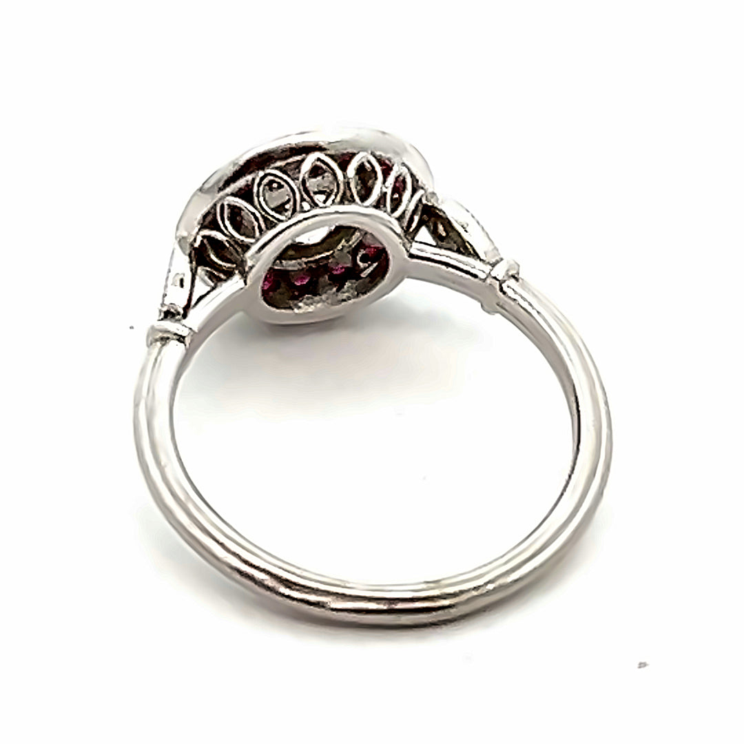 Platinum Art Deco 0.78 Carat Diamond And Ruby Halo Ring