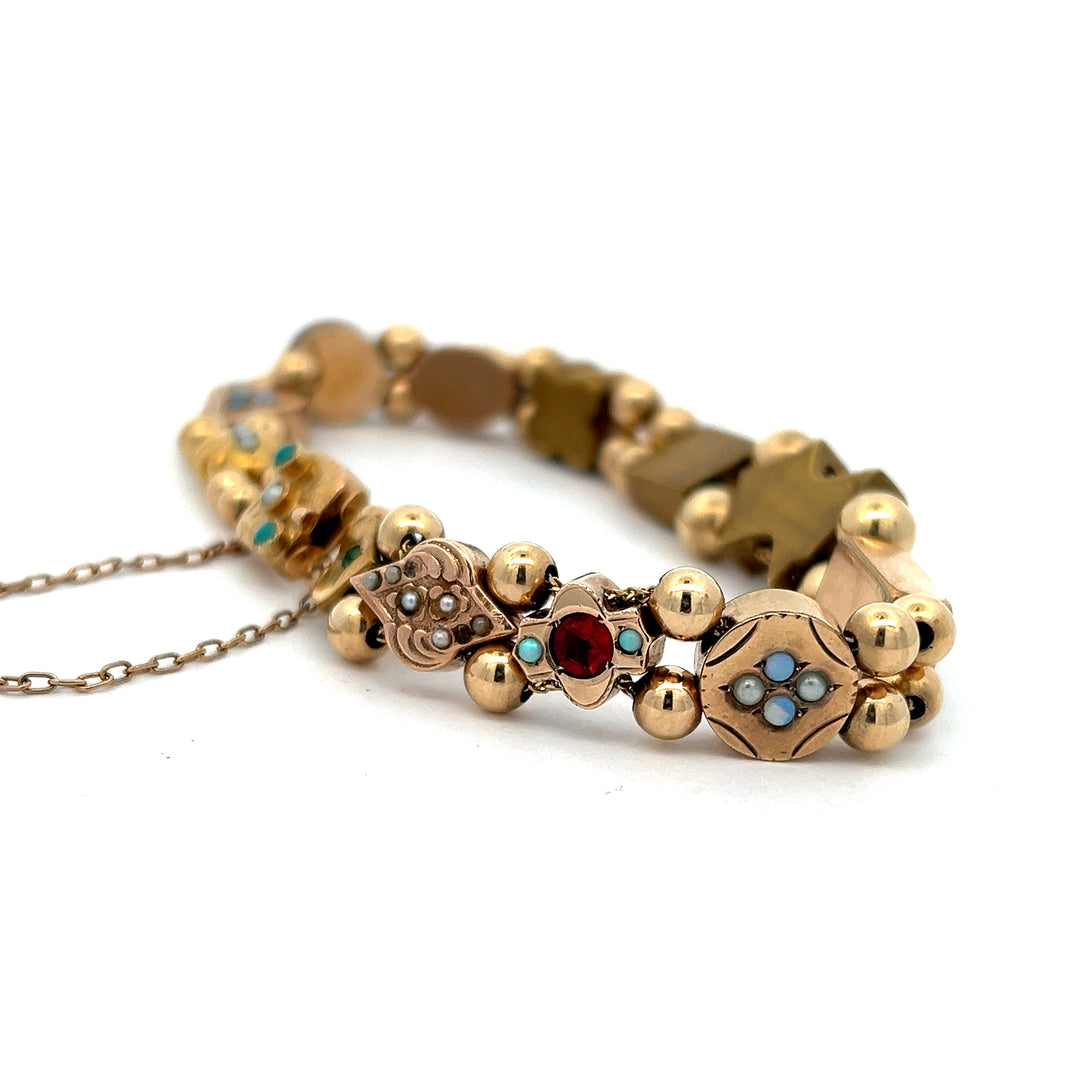 Late 1800s Slide Bracelet, Mixture Of 14K, 10K, And Gold Filled Charms